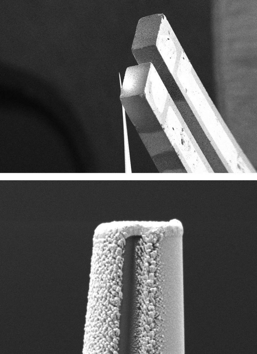 The Weizmann nano-MRI system viewed under an electron microscope. Top: A tuning fork that enables control of the distance from the quartz tip to the diamond sensor, thereby controlling the gradient of the magnetic field around the sensor. Scale: 300 microns. Bottom: A closeup of the tip with a quartz center (the darker shade), coated with a gold conductor in the shape of a square arch (the lighter shade). Scale: 500 nanometers